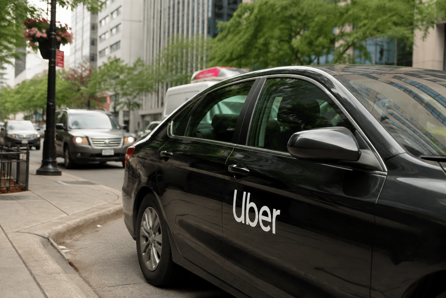 Uber cuts 3,300 jobs, stock rises 2% as robotaxi push intensifies